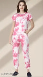 Exclusive pink polyester smoking and shaded nightsuits for women, dyed/washed net style on display