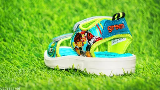 Orange EVA sandals with tan and green accents for Chota Bheem kids' summer wear, featuring cartoon character patterns. Velcro fastening detail. Size: 18-24 Months. Made in India