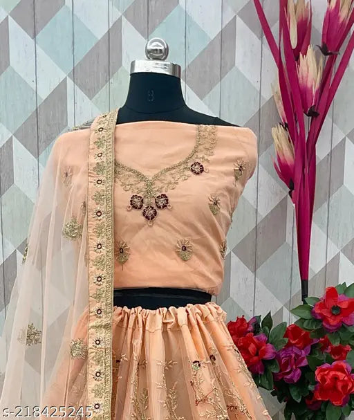 Embroidered peach net choli and dupatta set from India