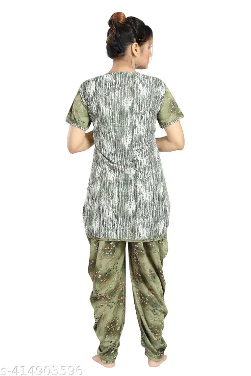 Green polyester LIFETALE Dhoti Top Night Suit with printed net design, featuring round neck and short sleeves. Includes matching dhoti-style bottom with side pocket. Indian origin