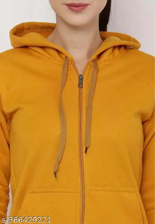 Mustard color cotton blend hoodie sweatshirt with zipper detail, solid pattern, long sleeves on mannequin