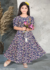 Cotton printed net girls gown for kids wear, suitable for parties in sizes 6-9 Months to 4-5 Years. Comfortable and affordable choice for baby girls from India