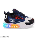Boys canvas lighting shoes with rubber sole, solid net pattern, KIDS LIGHT SHOES from Boomer Cubs on display stand, Indian origin