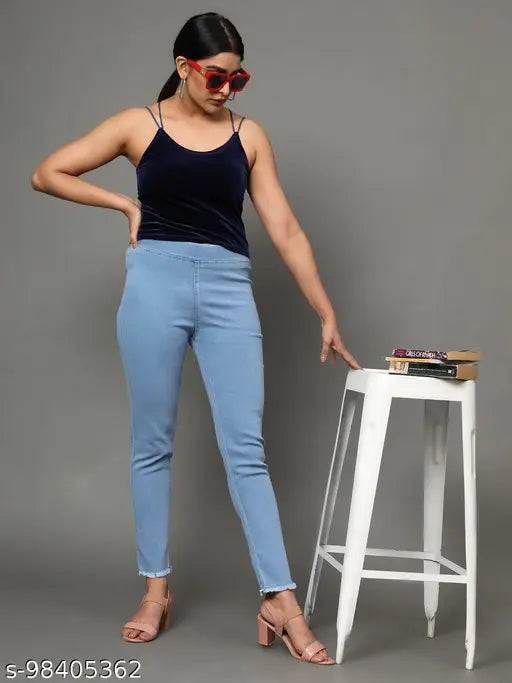 Solid skyblue denim jeggings for women, stretchable medium waist with elastic belt closer and ankle length