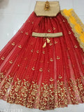 Red Indian culture embroidered organza lehenga choli & dupatta set, unstitched in red, gold, and yellow with mirror work patterns on display