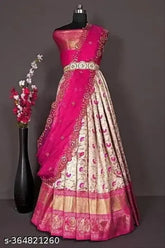 Unstitched kanjeevaram silk pattu pavadai for girls, short-sleeved traditional half-saree in free size. Indian handcrafted silk lehenga and net dupatta with jacquard stitch and woven design