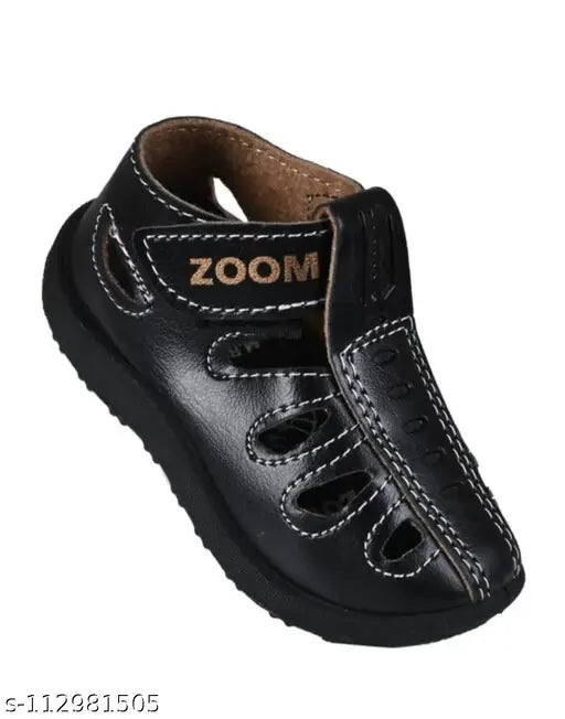 Leather and PVC black outdoor sandals for babies (6 mo - 5 yrs), made in India with closed toe design