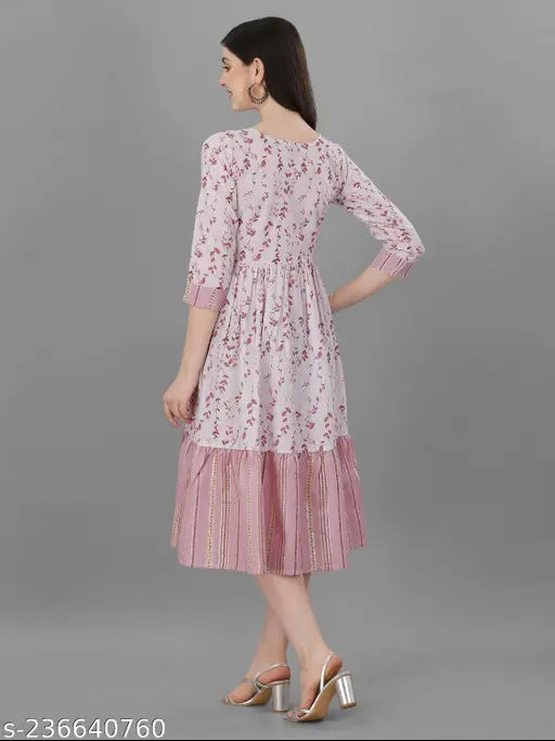 Purple floral printed fit-flared cotton kurti, three-quarter sleeves, eye-catching color, Indian ethnic design