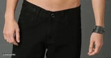 Men's black straight-leg jeans, high-quality cotton blend with dyed/washed pattern. Sizes available: 28, 30, 32, 34 (inches). Indian origin