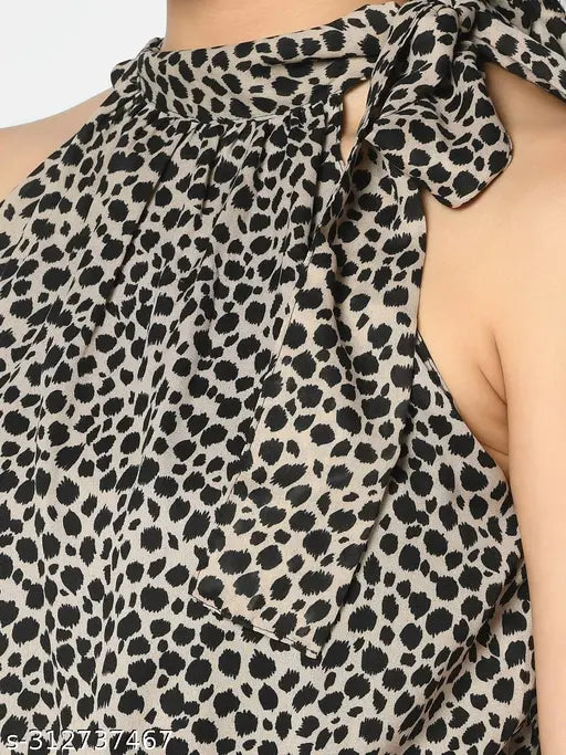 Blue printed polyester jumpsuit, sleeveless with halter neck - trending women's fashion from Raj Design Expo