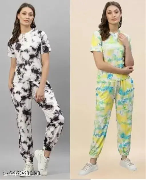 Trending poly crepe night suits for women & girls (S, M, L, XL), soft ambient lighting, plush bedding, modern decor, en-suite spa bath, premium amenities, India-made