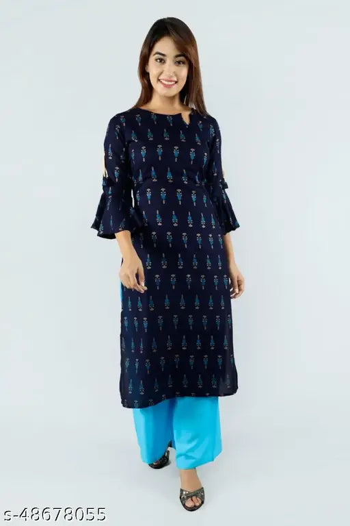 Rayon Abhisarika Kurta set with printed net design, three-quarter sleeve length and matching palazzo bottoms, sky blue color, Indian libaas fashion