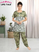 Green polyester LIFETALE Dhoti Top Night Suit with printed net pattern, featuring round neck and short sleeves. Bottom is dhoti style with side pocket. Indian origin