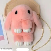 Pink fluffy rabbit sling bag, soft fabric, kids shoulder bag with removable golden chain. Cute cartoon rabbit design, great for girls' fashion accessory