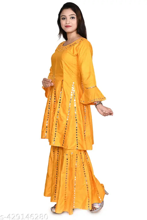 Vibrant yellow embroidered Anarkali Kurti Set with Sharara, mustard rayon fabric, three-quarter sleeves. Ideal for festive occasions or celebrations, modern take on traditional Indian fashion