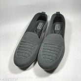Grey PVC slip-on shoes for girls, featuring solid pattern, available in sizes IND-5 to IND-9