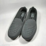 Grey PVC slip-on shoes for girls, featuring solid pattern, available in sizes IND-5 to IND-9