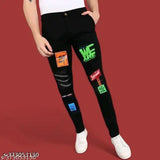 Men's black slim fit jeans, cotton blend, placement print. Modern style, lightweight, stretchable, breathable. Available in sizes 26, 28, 30 (waist: 26in, 28in, 30in; length: 39in). Origin: India