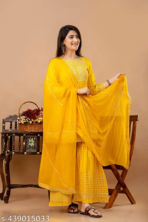 Rayon yellow embroidered Anarkali set with dupatta and sharara, festive collection in India