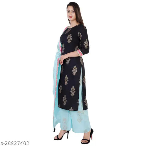 Cotton Aagyeyi Graceful Women Kurta Set with three-quarter sleeves and palazzos, printed net design. New Indian fashion trend." (124 characters)