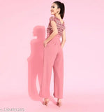 Embellished pink jumpsuit with net, sequins, and fringe detailing. Dusty pink polyester solid, short sleeves and V-neck. Women's Miss Chase size N, XS - XL. Made in India
