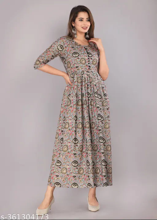 Rayon printed women's kurti with three-quarter sleeves, vibrant design and multiple sizes available (M-XXL) for daily wear and high fashion occasions