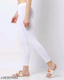 Minimus white cotton leggings for women and girls, solid net ankle length bottom wear on display stand