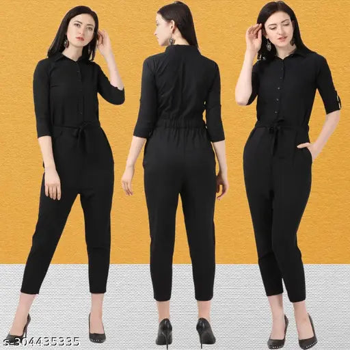 Black poly crepe women's & girls jumpsuit, solid design, three-quarter sleeves. Perfect for everyday or formal occasions, India origin." (124 characters)