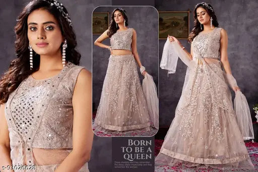 Attractive heavy designer lehenga choli with dori embroidery and stone work, fully stitched in net fabric, L size from India