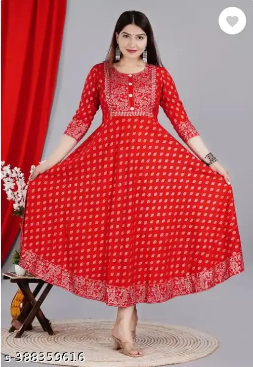 Rayon printed anarkali kurti for women, three-quarter sleeves, vibrant pattern, Aayush Associates product on hanger