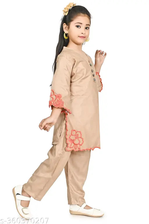 Brown polycotton embroidered net kids kurti pant set, three-quarter sleeves, medium size, for 6-7 years old children on display