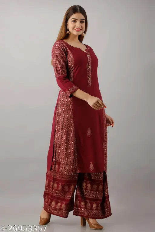 Refined rayon kurta sets for women, printed net design, three-quarter sleeves with palazzo bottoms, Banita brand