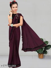 Attractive poly silk sleeveless baby girl saree for weddings and festivals. Solid net pattern, India origin