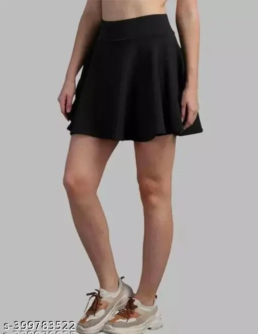 Colorful striped skater skirt with attached inner shorts, high-quality imported fabric, flared silhouette and laser cutout scallop hem. Stretchy for comfort, perfect fit, and versatile style suitable for all seasons. Available sizes: 26, 28, 30, 32, 34, 36 (waist sizes indicated). Origin: India