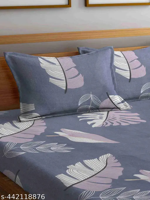 Indian-made double glace cotton bedsheet with elastic fit and 2 pillow covers, showcasing a captivating 3D botanical design for a cozy summer sleep