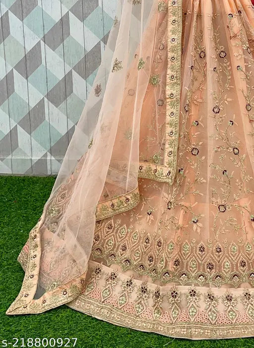Embroidered semi-stitched net lehenga choli set, perfect for weddings and festivals. Free size with 2.5m dupatta length. Indian-made embroidered wedding attire