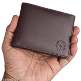 Brown genuine leather RFID wallet with pen & keychain combo set (3 card slots), featuring a chic, sophisticated design. Hand-stitched, dyed, and aged for durability. Multiple compartments keep items organized. Ideal for storing personal and financial items securely. Made of rich, luxurious leather. Dry clean only. Genuine leather color may vary. Indian origin