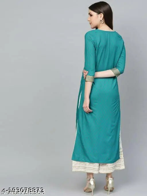 Gold rayon kurti and palazzo set with three-quarter sleeves, printed pattern. GOLD printed Indian kurta and bottomwear for women