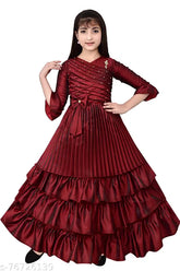 Maroon silk frock dress for girls, embellished net pattern, three-quarter sleeves. Quality Indian-made garment suitable for 7-8 years (bust 28 in, length 36 in). Girls' gown dresses, affordable and comfortable. #GOWNDRESSESFORGIRLS #barbie #looklikebarbie #SUMBULFASHION #princessdresses