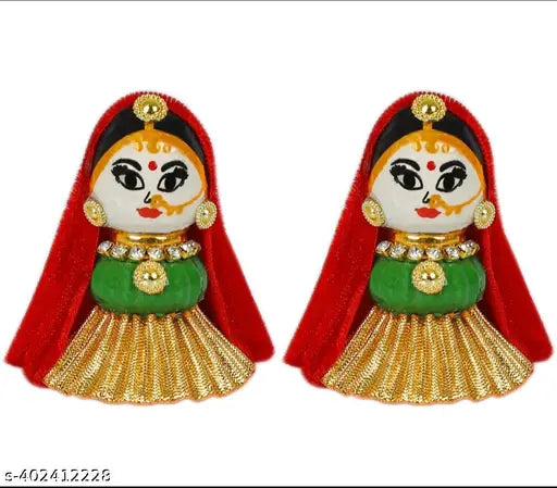 Synthetic resin idol of Lord Riddhi & Siddhi, adorned with jewelry & intricate designs, Indian origin, divine aura