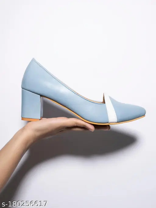 Synthetic blue heeled pumps with pointed toe detailing, slip-on fastening for stylish casual wear