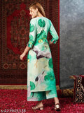 Green cotton blend printed straight kurta with palazzos, three-quarter sleeves on fashionable woman model