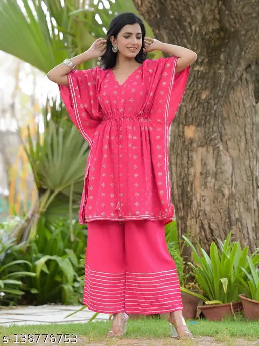 Rayon trendy kurta set with palazzos, printed net design, short sleeves. India-made fashion for women