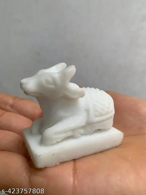 White marble Shiv Nandi Idol, 2-inch for Pooja Mandir. Handcrafted, resin figurine featuring Adi Shankara's depiction. Perfect for spiritual altars and Hindu decor