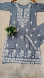 Rayon chikankari work kurti set with printed dupatta for women, rayon fabric, three-quarter sleeves, kurta and palazzo set on display