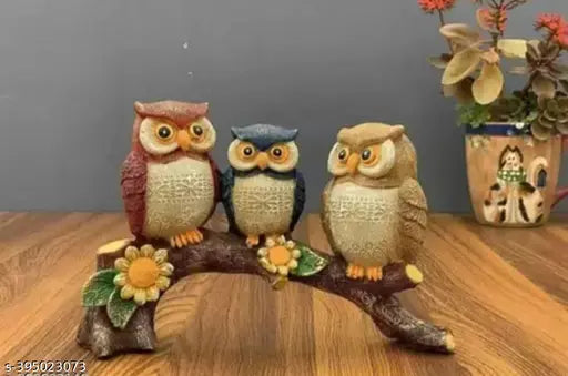 Multicolor owl family resin figurine set, adds elegance to home decor. Handmade in India