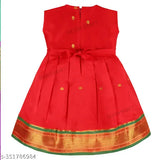 Vibrant red & green Chanderi silk embroidery frock dress for baby girls, Indian traditional clothing on display