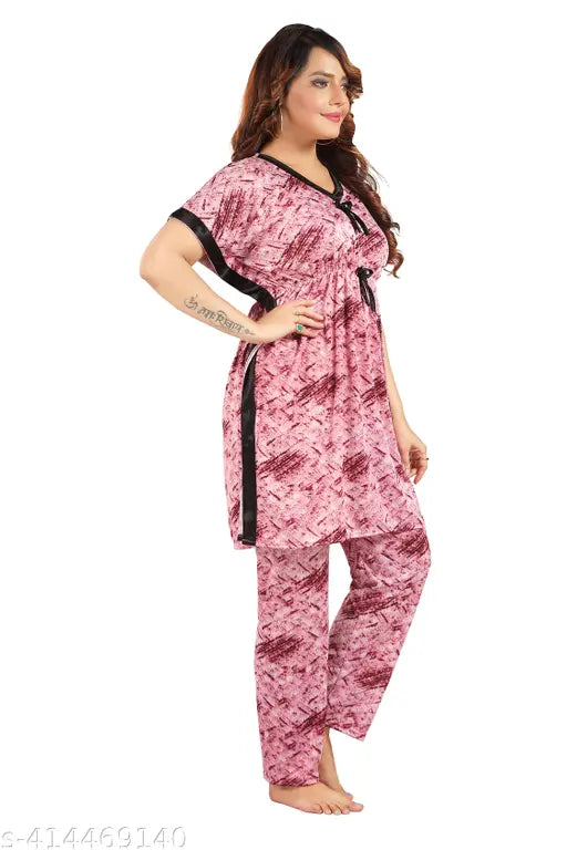 Women's printed satin kaftan night suit set - knee length kaftan top & pyjama set. Printed satin nightwear for women and girls on display
