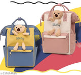 Brown polyester maternity diaper bag, spacious and water-resistant, with multiple compartments for baby essentials. Fashionable mom bag with built-in wet clothes pouch and keychain." (109 characters)