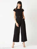 Black crepe short-sleeve jumpsuit by Miss Chase, solid pattern with belt and pockets, XS to XL sizes available